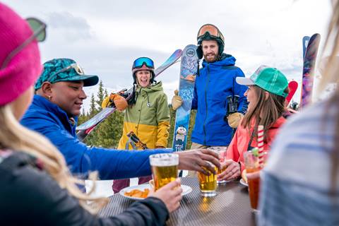 Group of people at happy hour at Winter Park Ski Resort