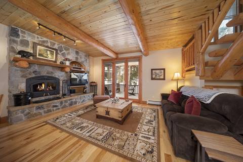 living room of log cabin style home