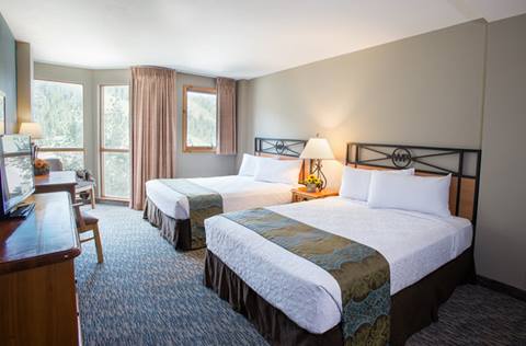 Hotel room with 2 queen beds and large windows