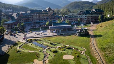 Aerial view of the base of winter park resort in the summer 