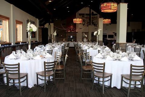 Dining room at an industrial style mountain wedding venue at Winter Park Resort